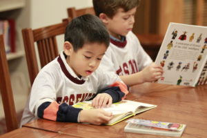 5-year old boys reading books - Fessenden School, MA
